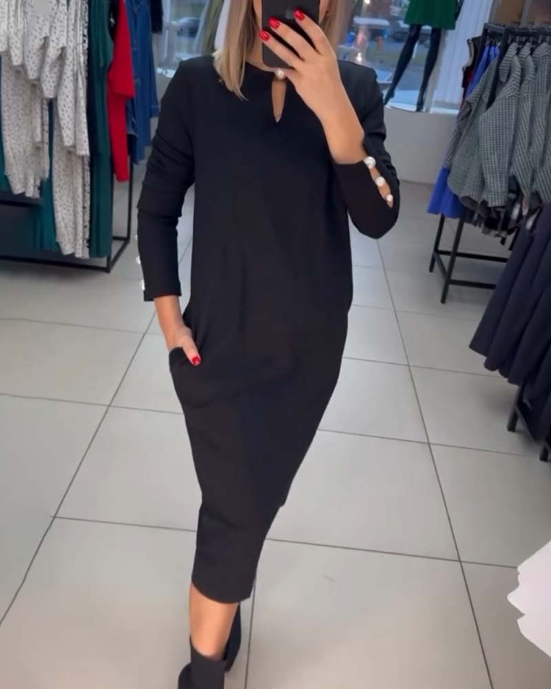 Elegant kjole med perleknapper