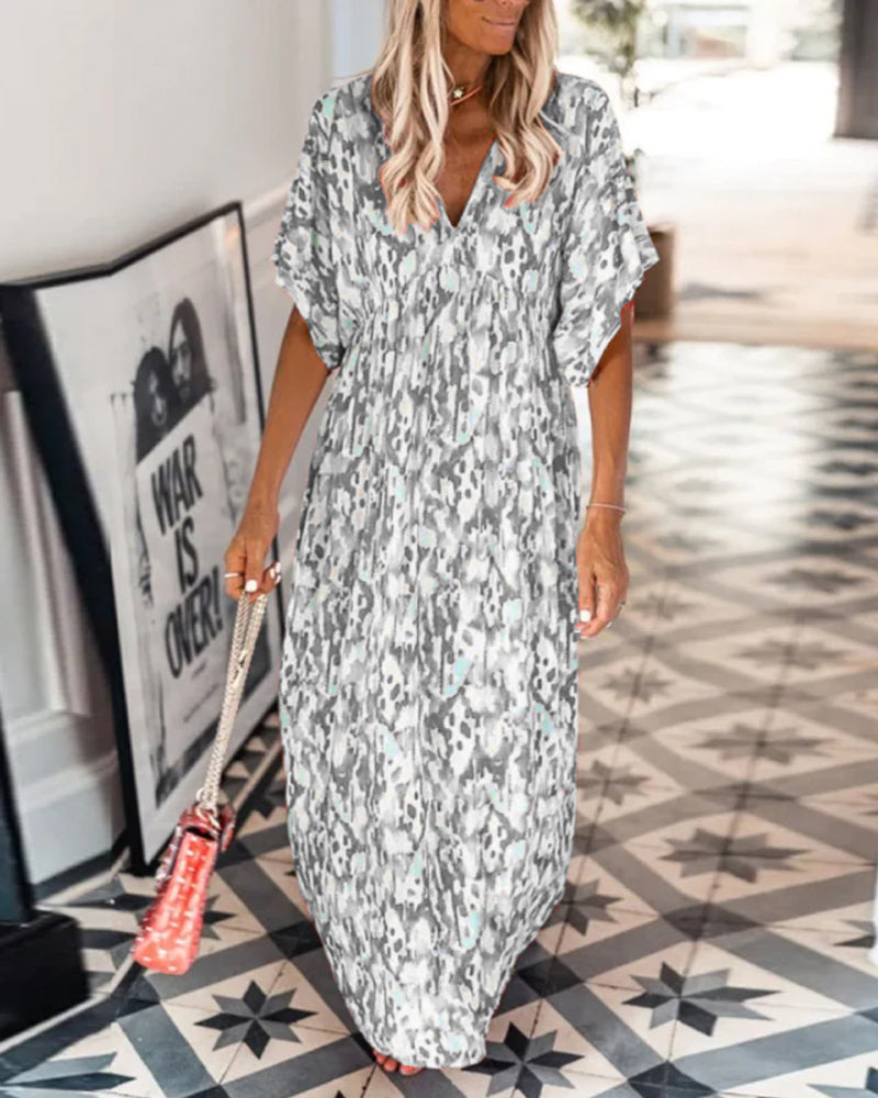 Stilfuld V-halset sommerkjole med korte ærmer