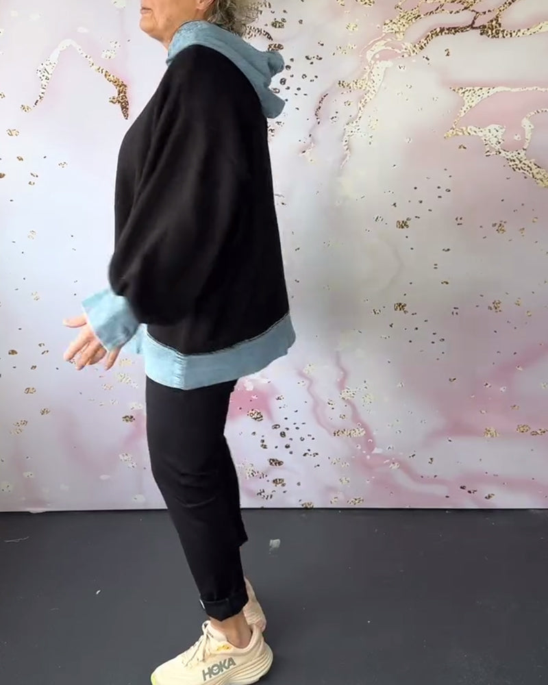 Afslappet hættetrøje med kontrastfarvede kanter