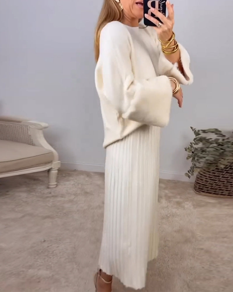 Elegant hvid sweater med plysmanchetter