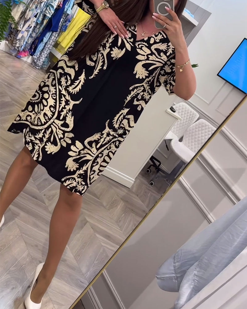 Knælang kjole med retro print