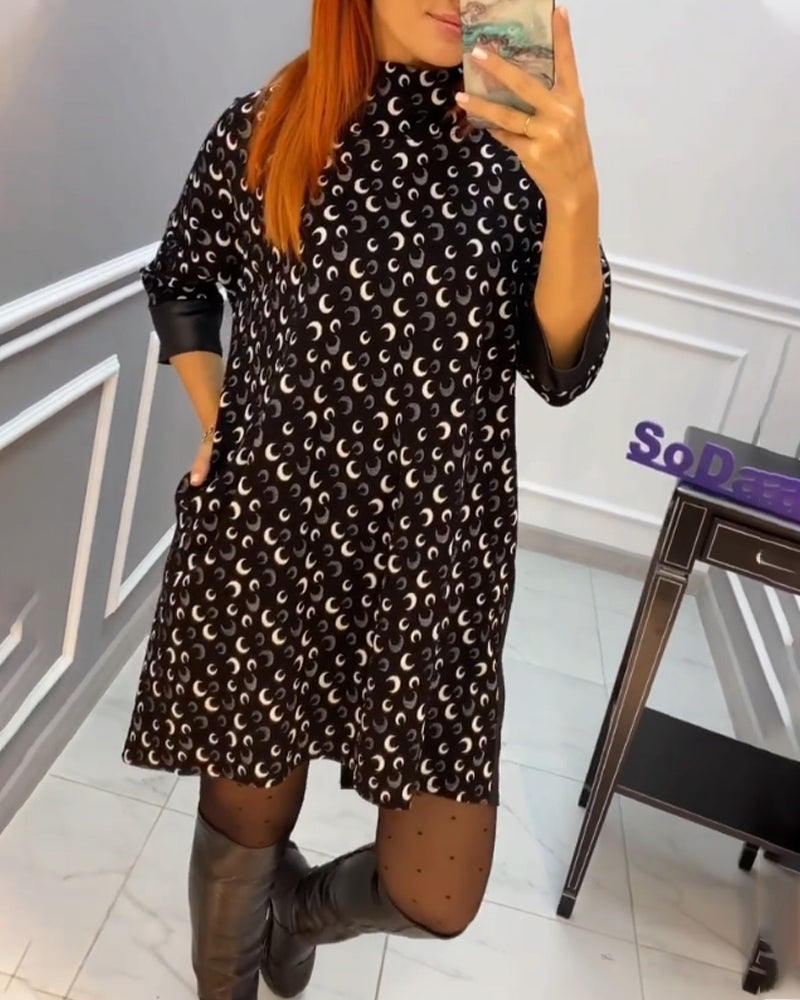 Afslappet sommerfugl kjole med print