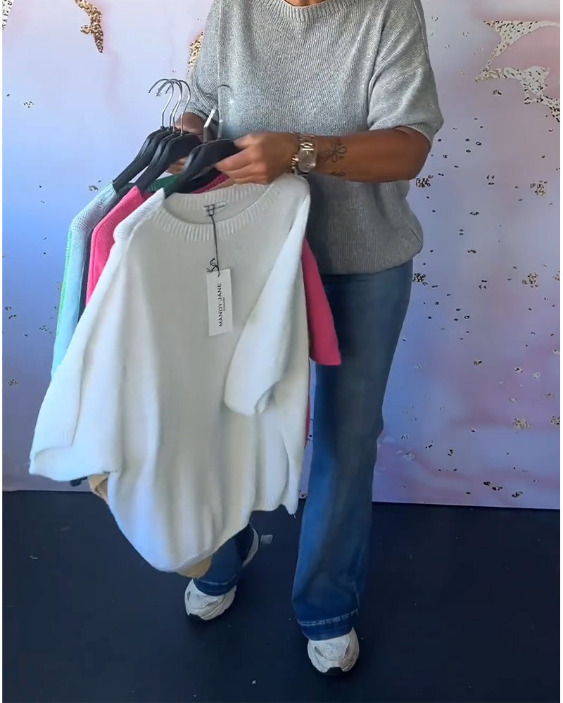 Løs ensfarvet pullover med rund hals