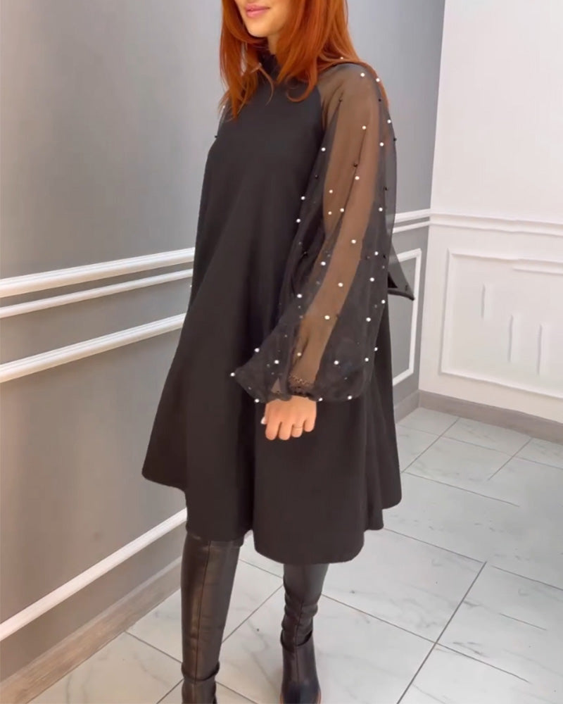 Kjole i løs pasform med mesh ærmer