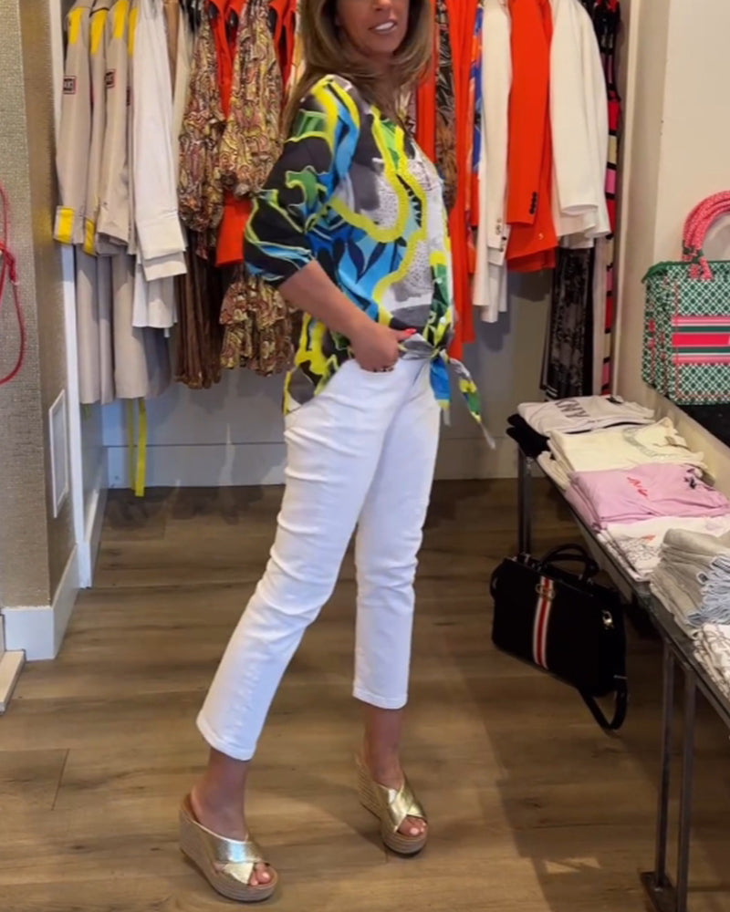 Bluse med V-udskæring og gule accenter