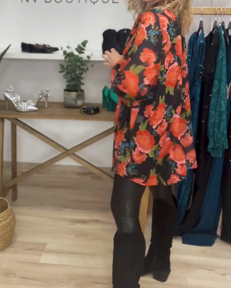 Lang blomsterbluse i løs pasform