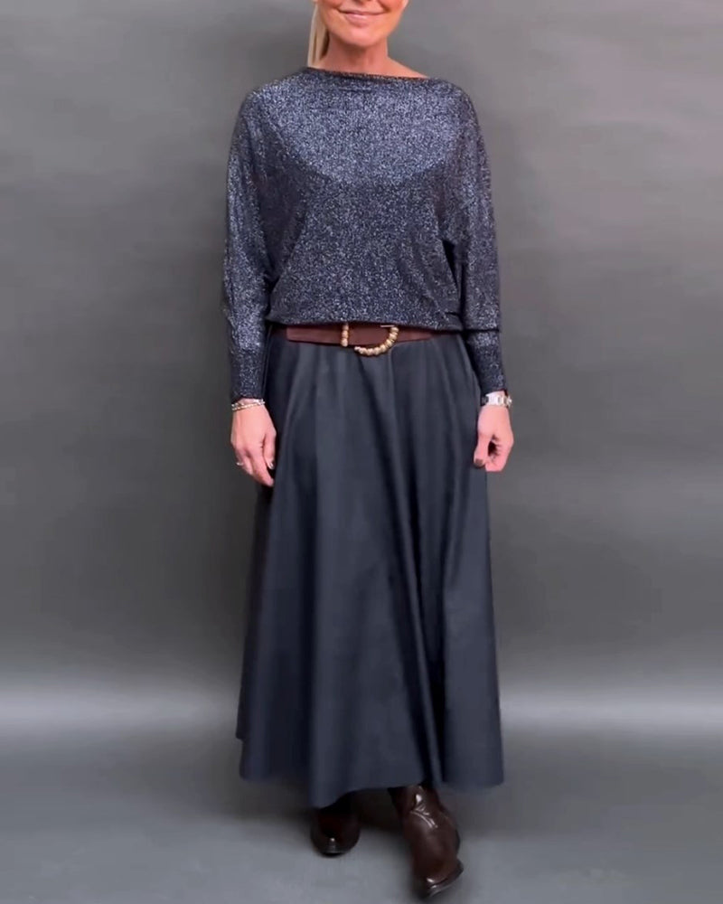 Skinnende top med rund hals og dolmanærmer