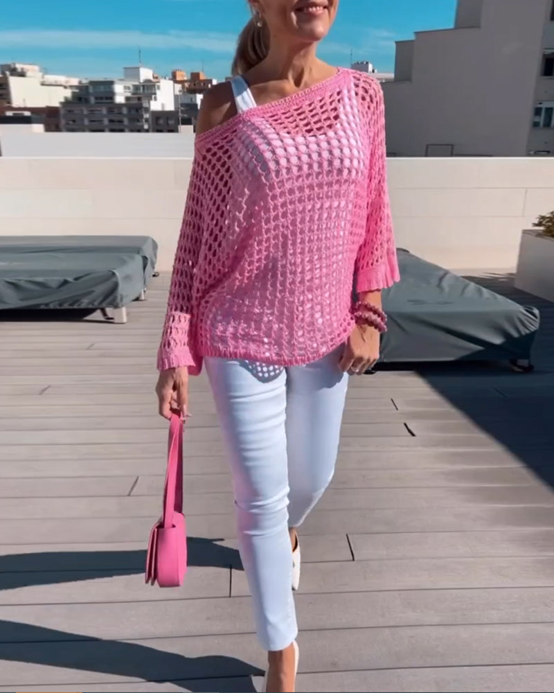 Ensfarvet top i udhulet netdesign