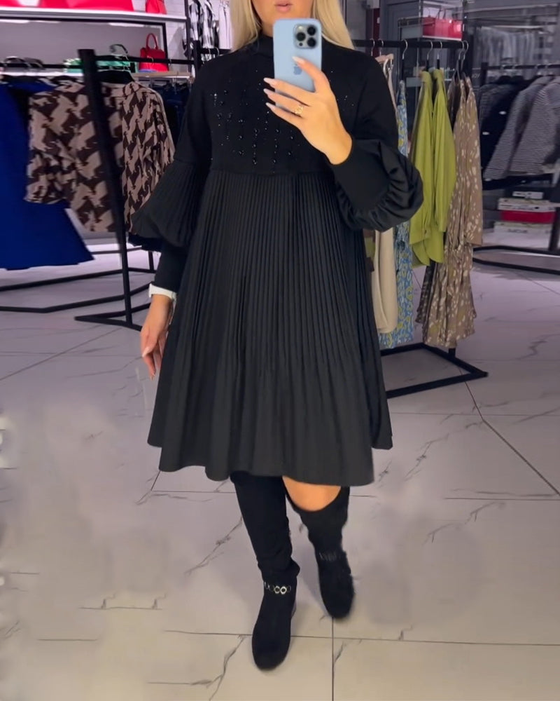 Kjole med svaj og ballonærmer