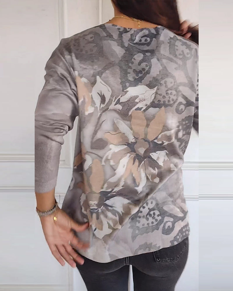 Langærmet blomstertop med V-hals