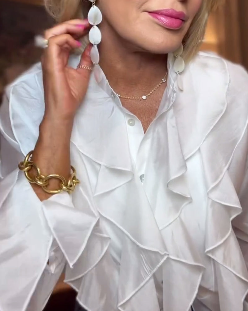 Elegant bluse med ensfarvet flæse