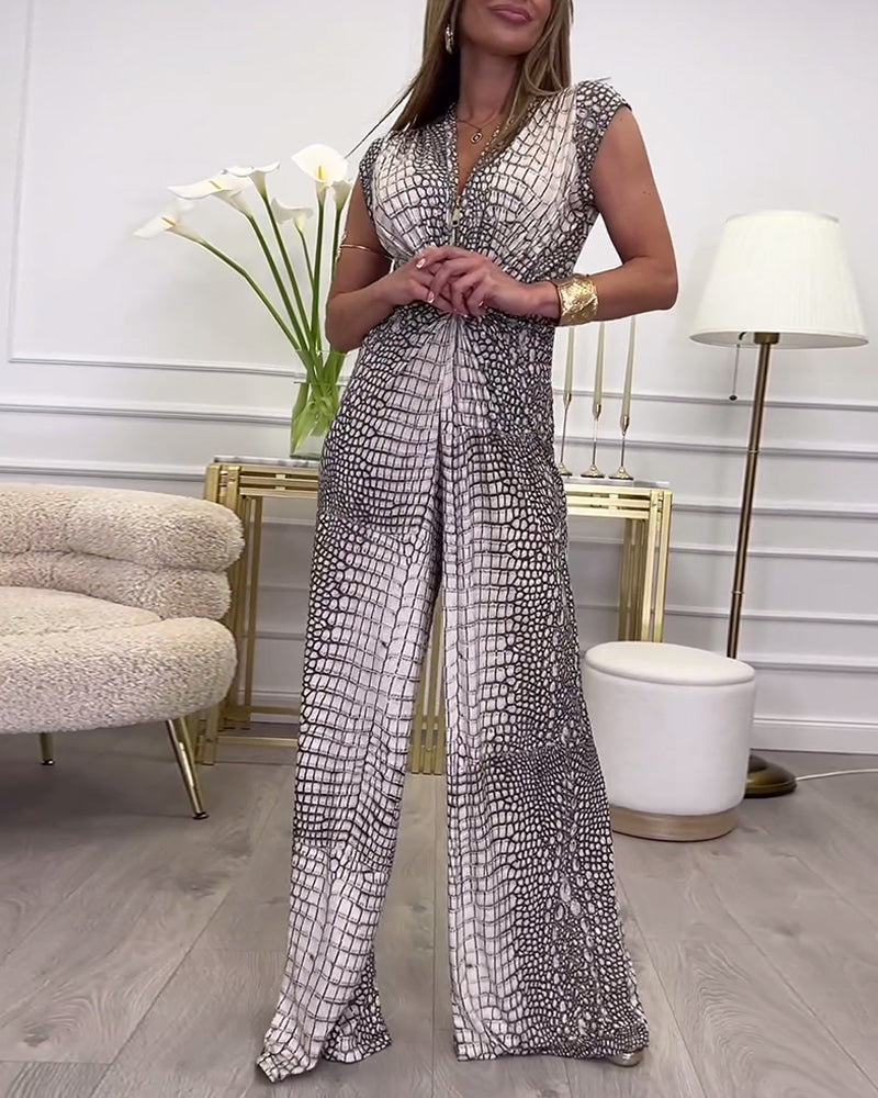 Mønstret jumpsuit uden ærmer med dyb V-udskæring