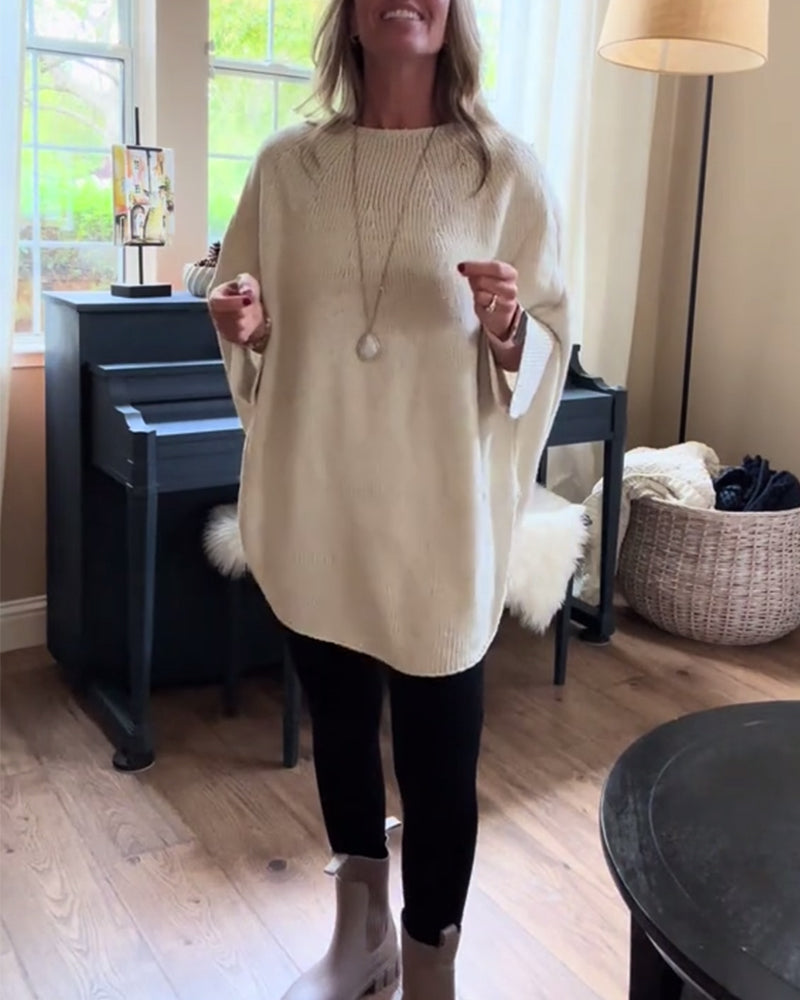 Stilfuld rød sweater i løs pasform med flagermusærmer