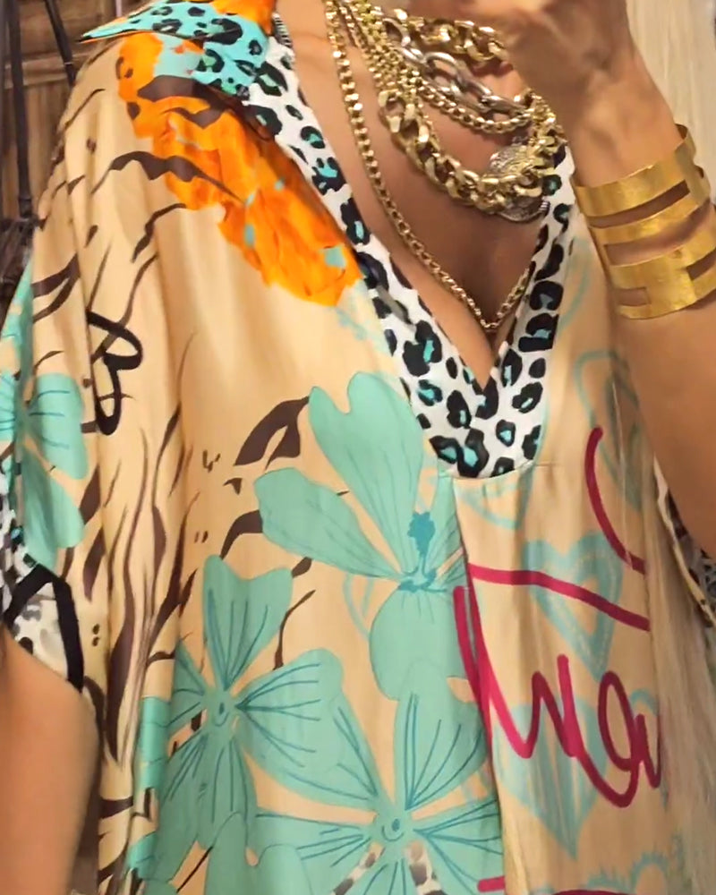 Farverig patchworkkjole med leopardmotiv og delvist leopardprint