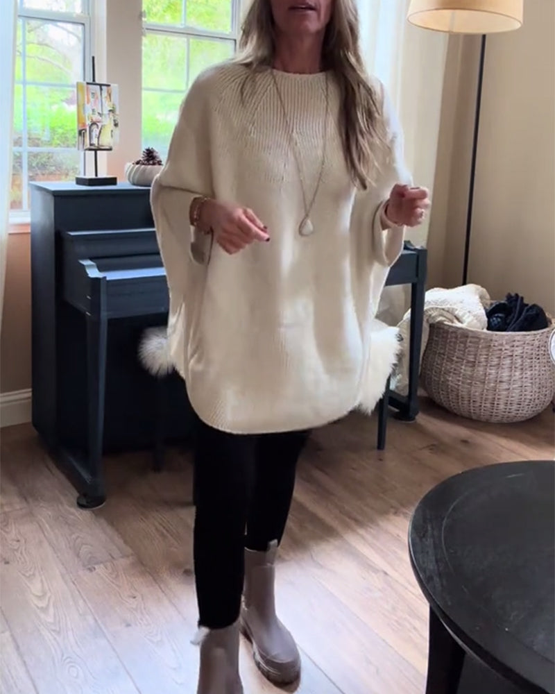 Stilfuld rød sweater i løs pasform med flagermusærmer