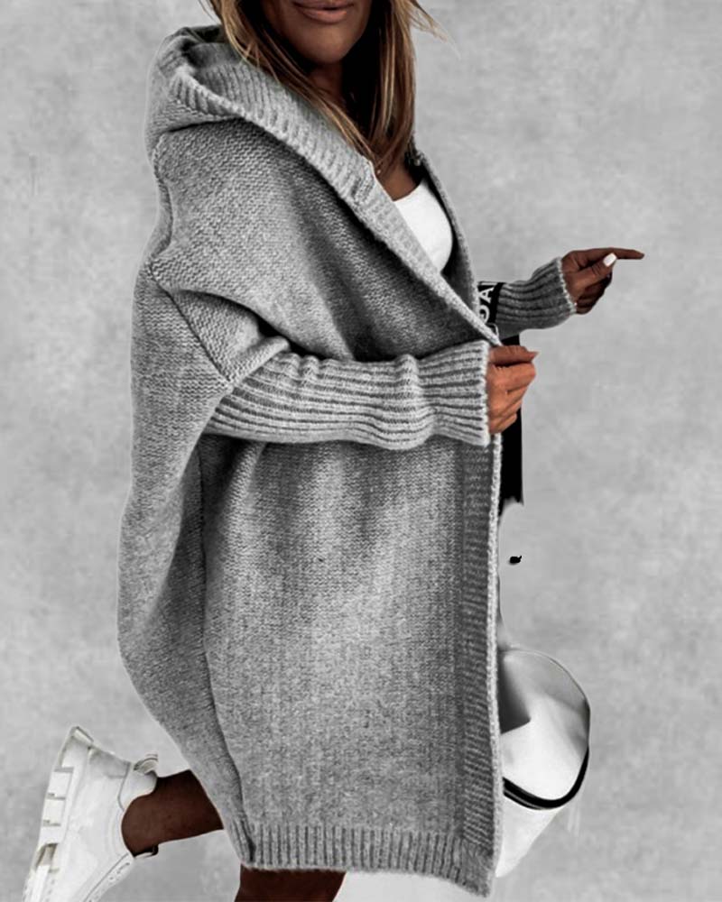 Oversized ensfarvet frakke