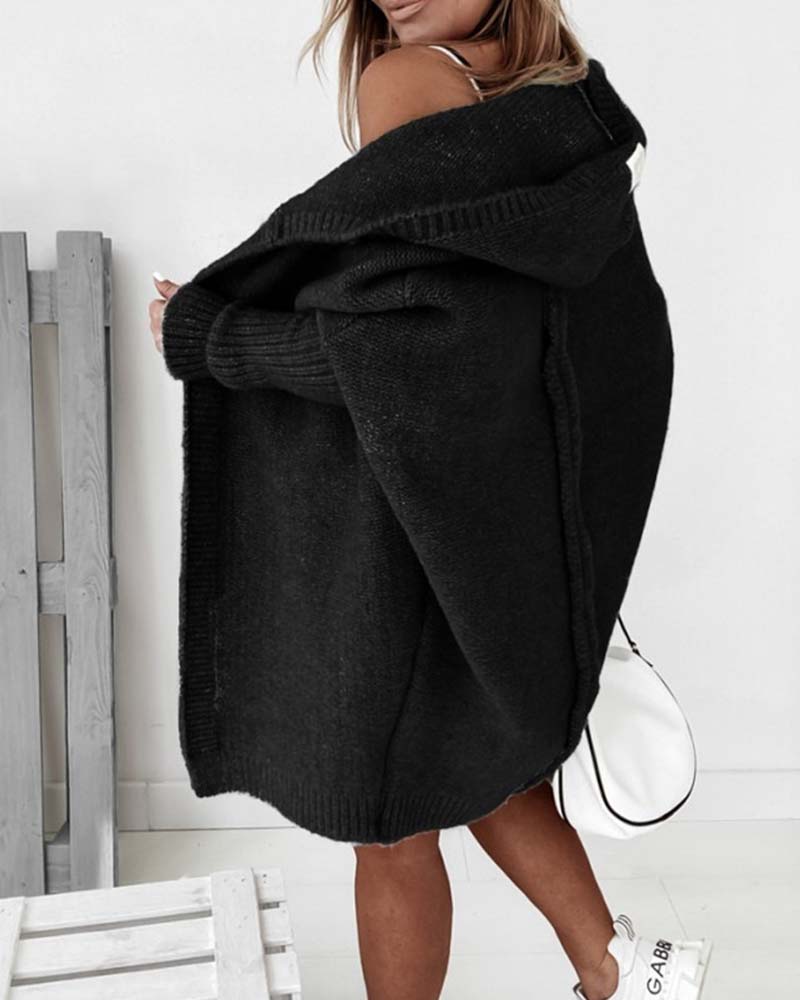 Oversized ensfarvet frakke