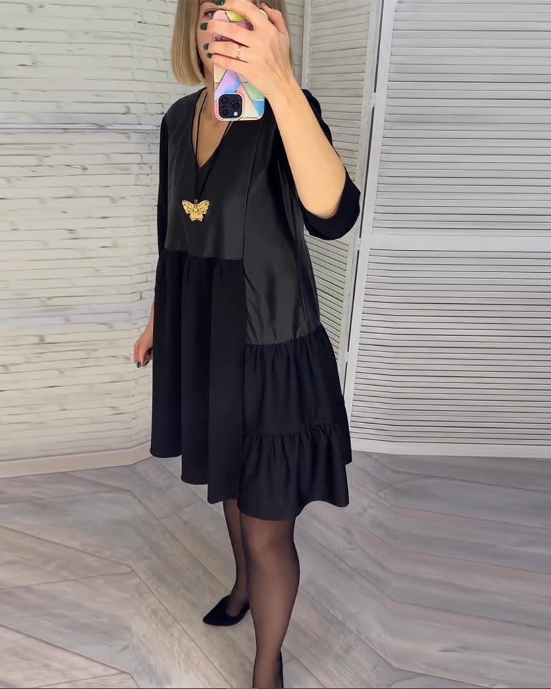 Patchwork kjole med V-hals