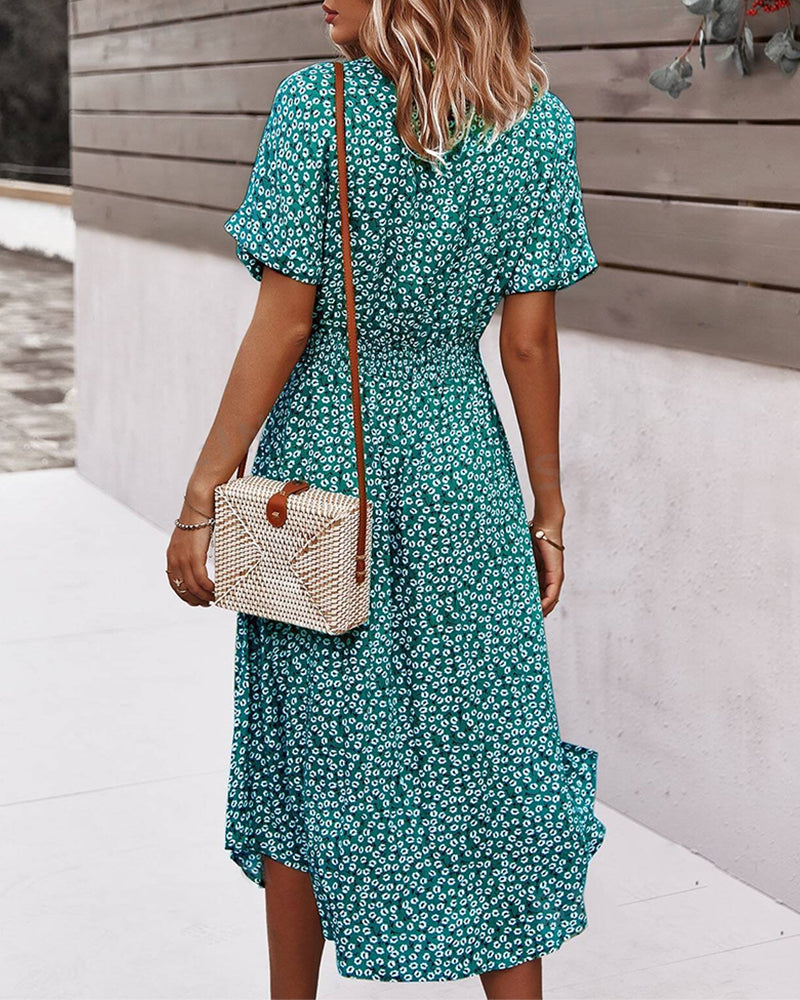 Koertærmet kjole med korte ærmer, nippet talje og blomsterprint