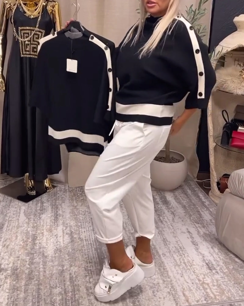 Sort sweater med hvid stribekant