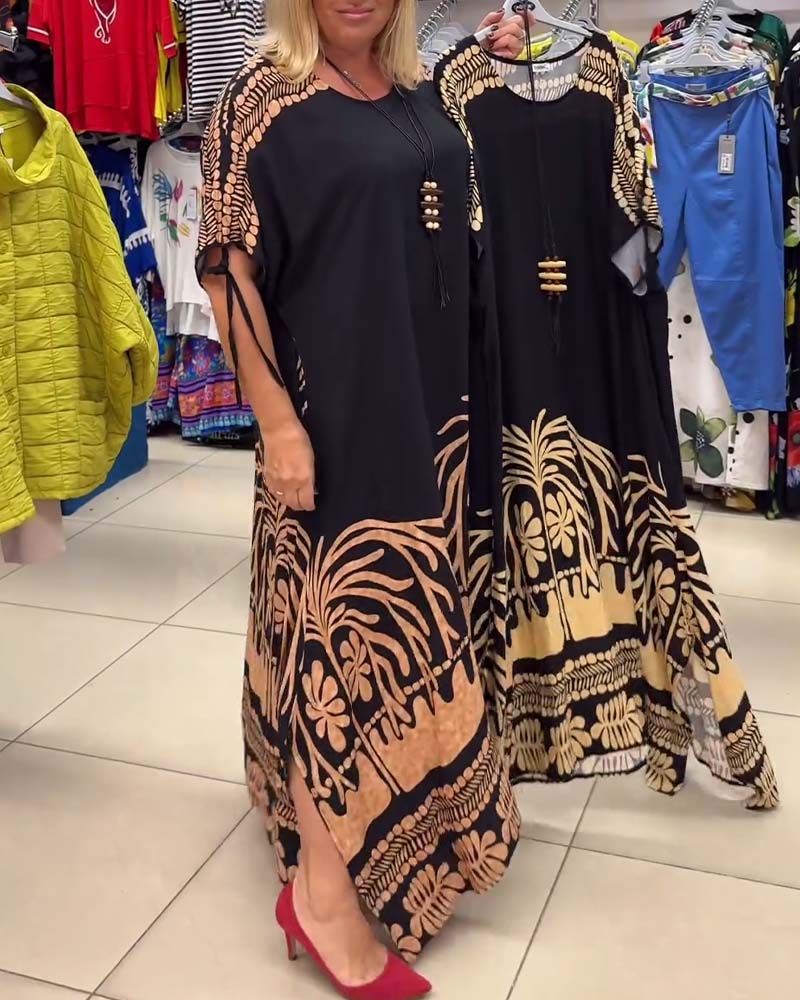 Kortærmet løs kjole med gyldent palmemotiv