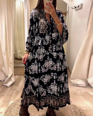 Løs vintage kjole med print og plissering