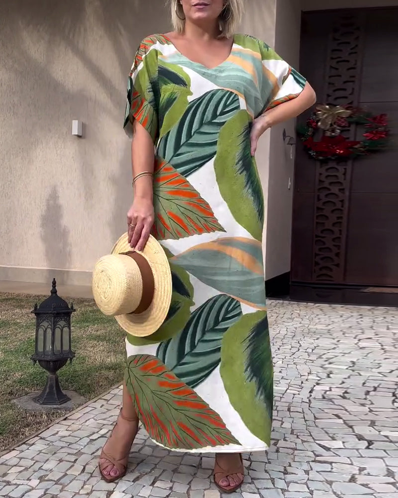 Afslappet kjole med korte ærmer og botanisk print