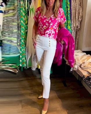 Kortærmet top med V-udskæring og print