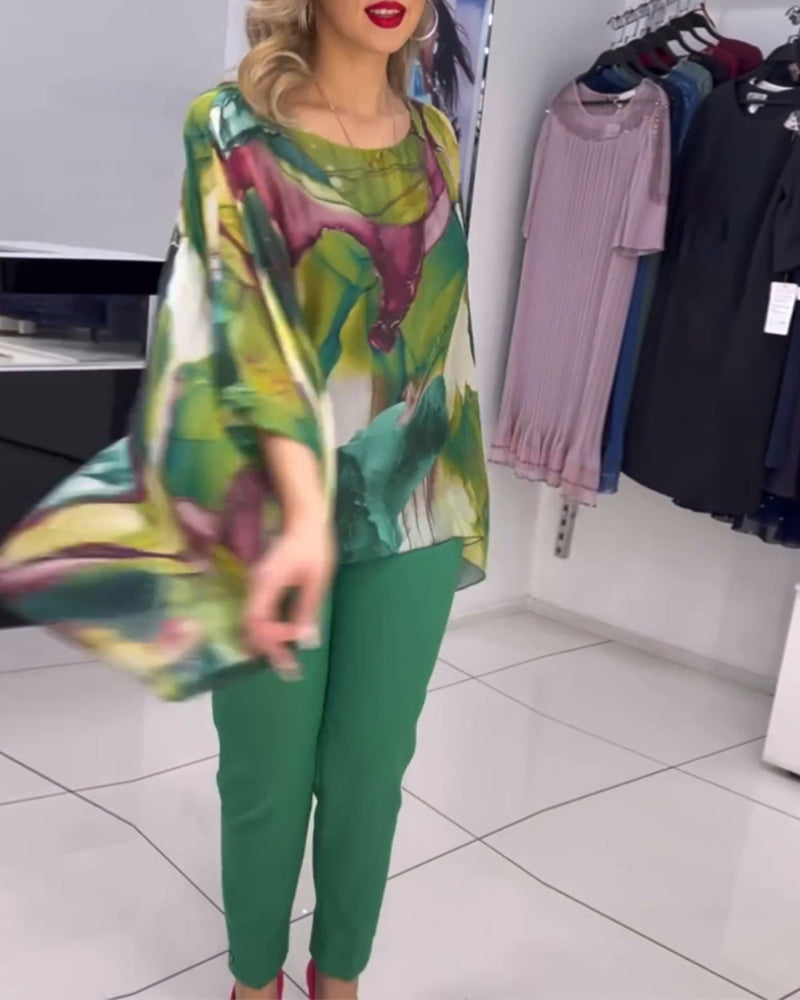 Rundhalset bluse med print og flagermusærmer