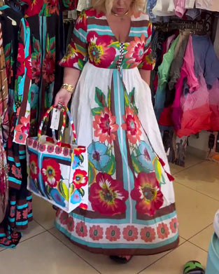 Lang blomsterkjole med svaj