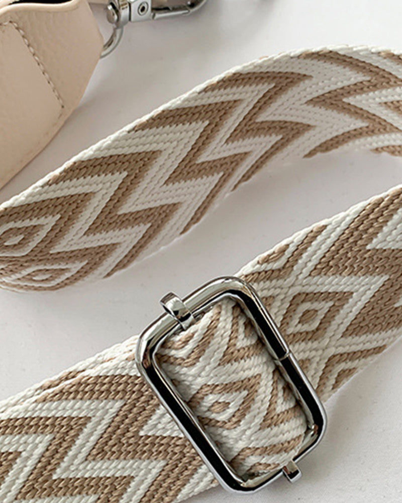 Skuldertaske med lynlås og mønstrede stropper