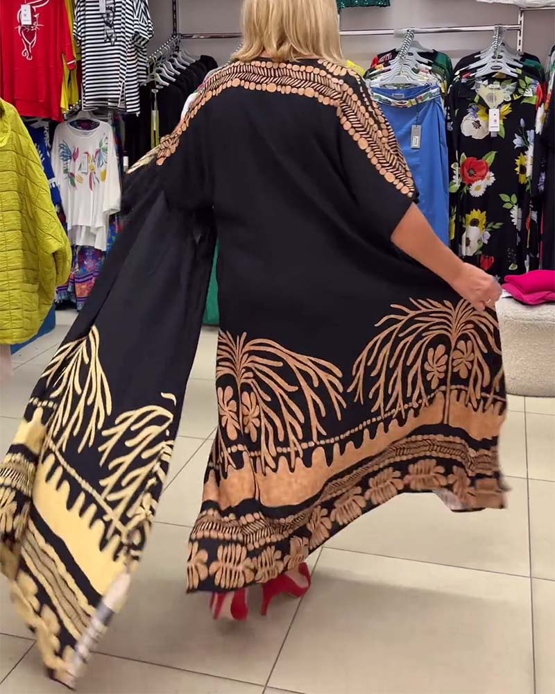 Kortærmet løs kjole med gyldent palmemotiv