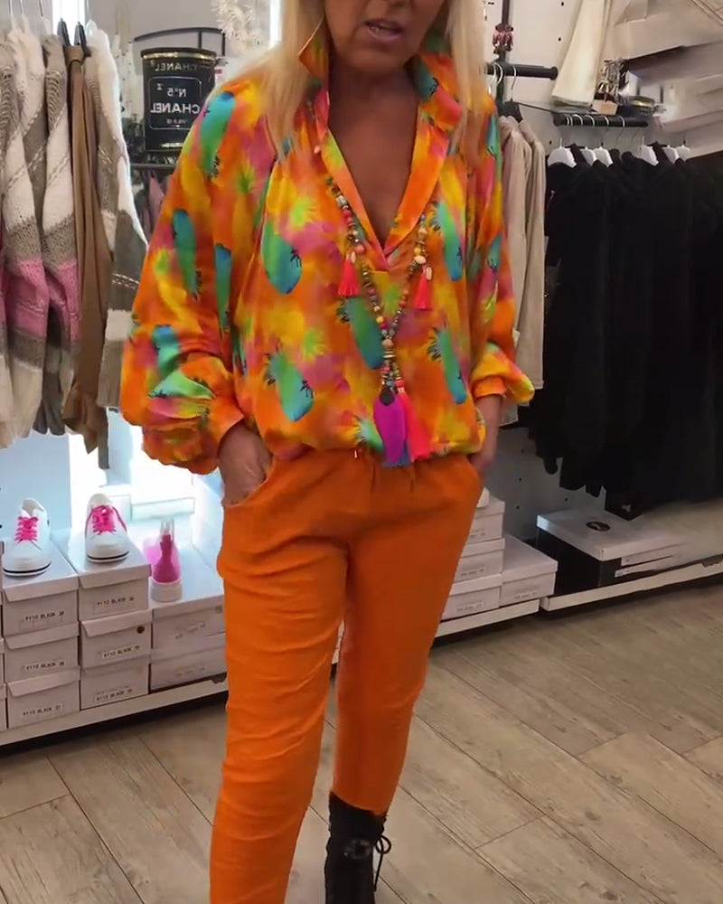 Orange bluse med reverskrave