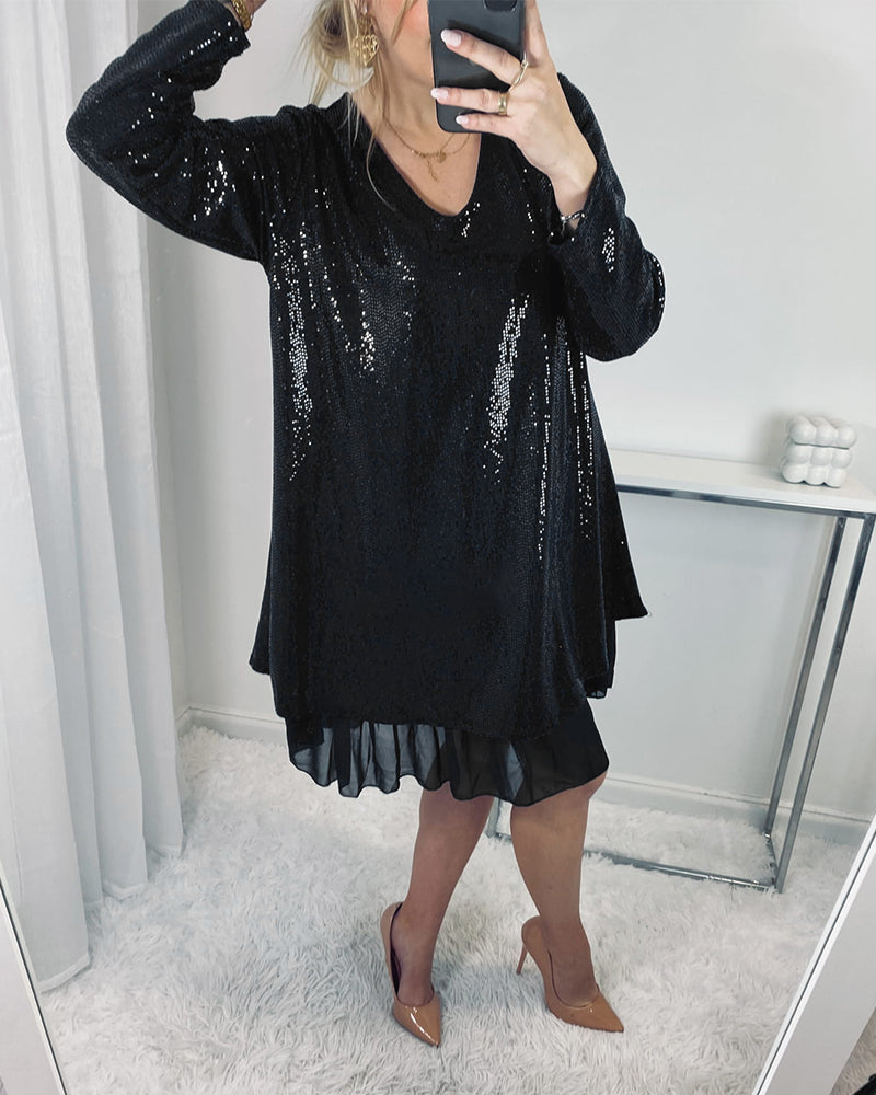 Elegant løs kjole med lange ærmer