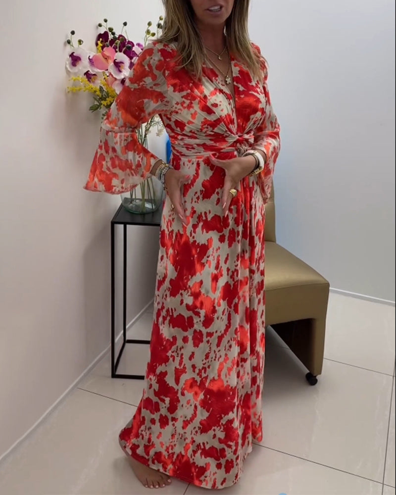 Stilfuld lang kjole med vide ærmer