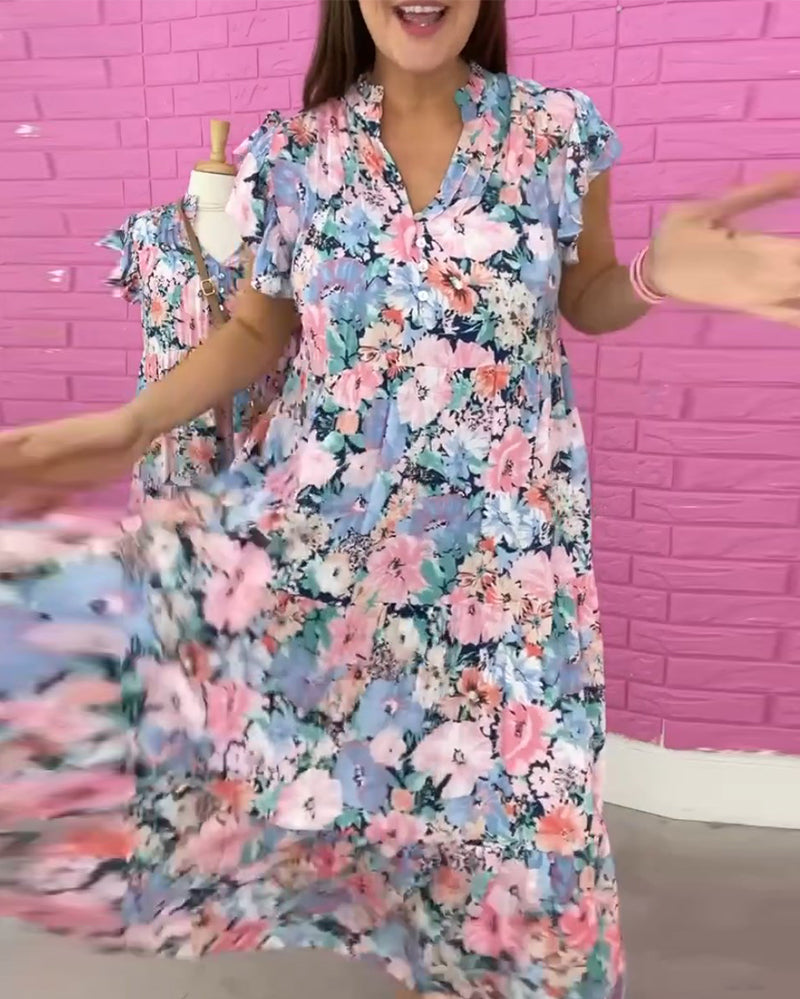 Blomsterkjole med V-hals i afslappet stil