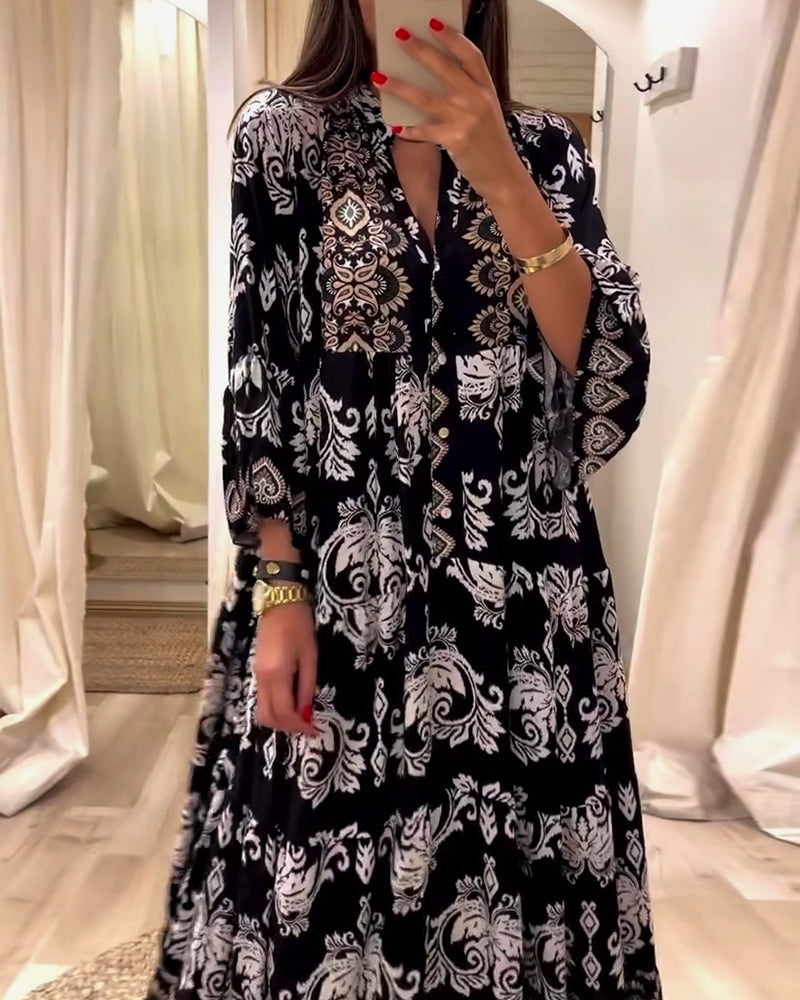 Løs vintage kjole med print og plissering