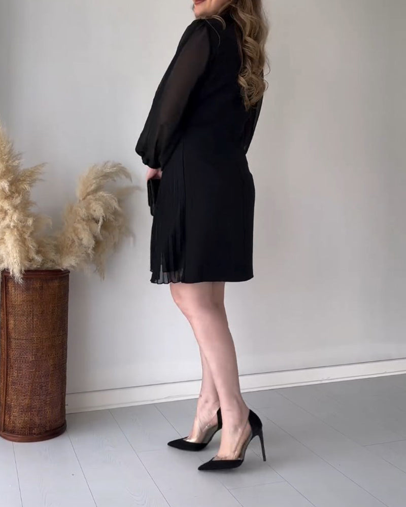 Kjole med guldspænde