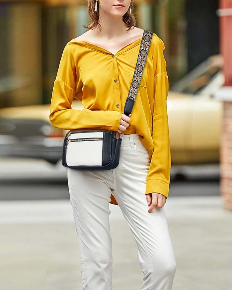 Multifunktionel crossbody-taske med lynlås