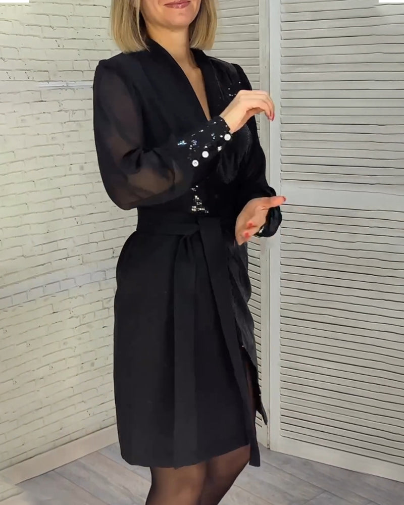 Kjole med pailletter og lange ærmer