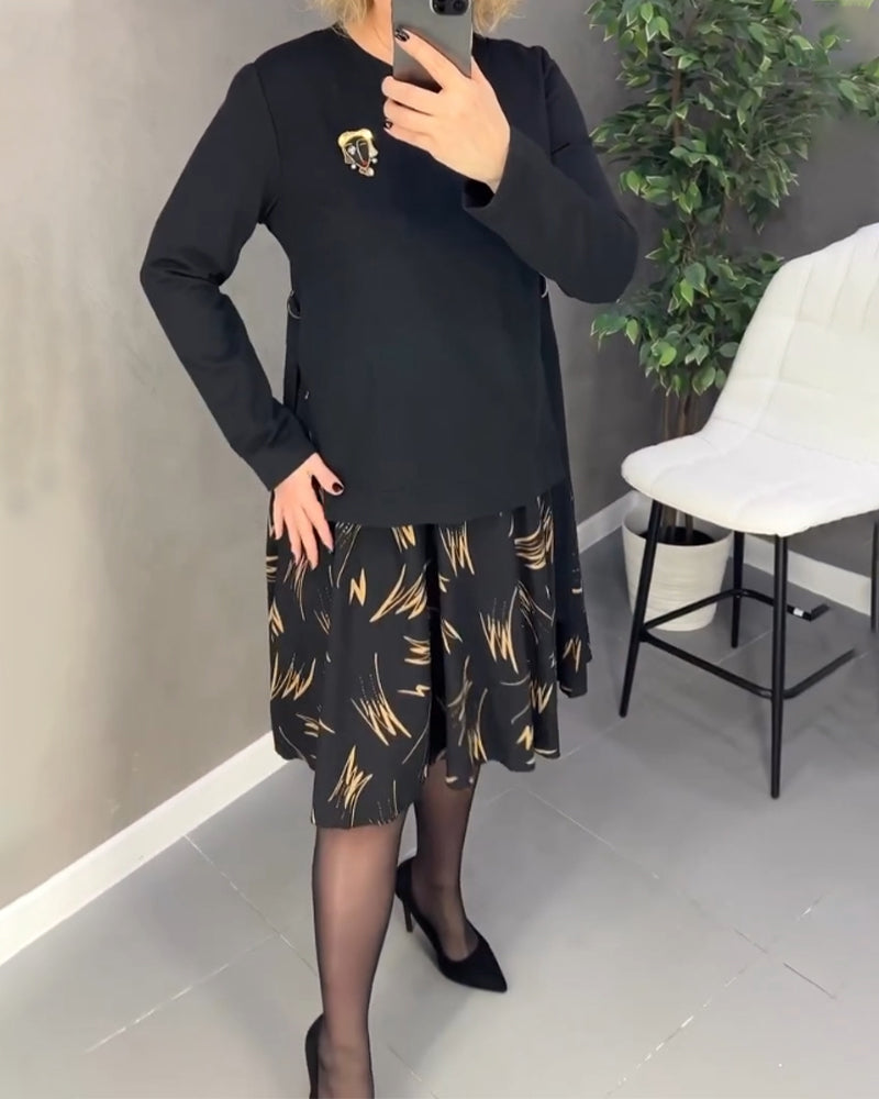 Afslappet kjole med mønstret nederdel