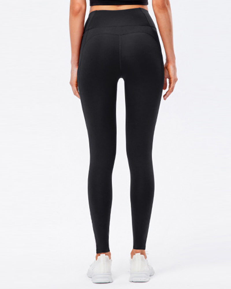 Ensfarvede leggings med fleecelommer