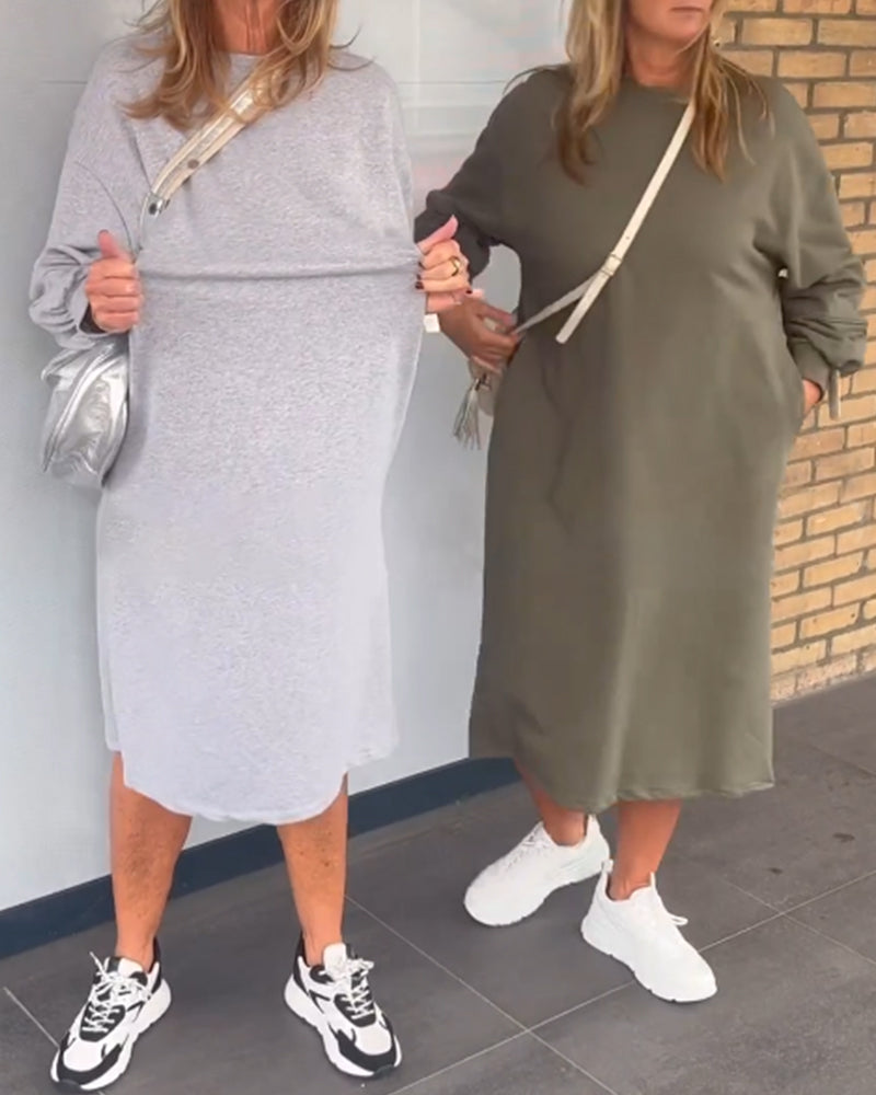 Ensfarvet lommekjole med rund hals