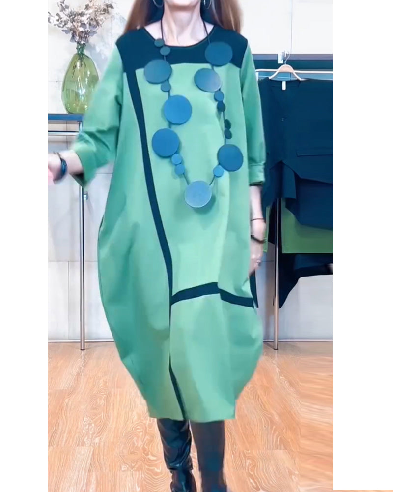 Stilfuld kjole med lodrette striber