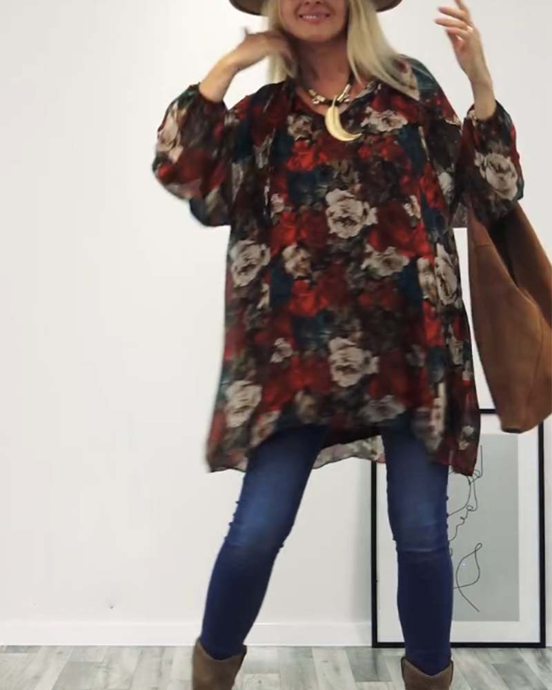 Stilfuld løs off-shoulder blomsterbluse