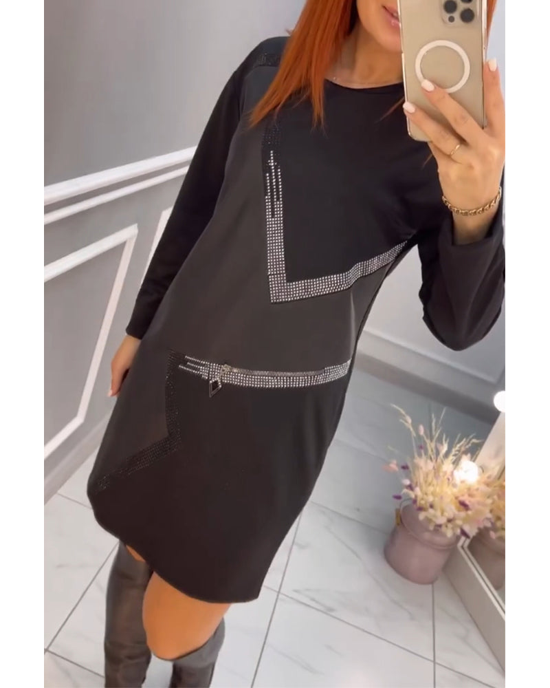 Stilfuld kjole med abstrakt print