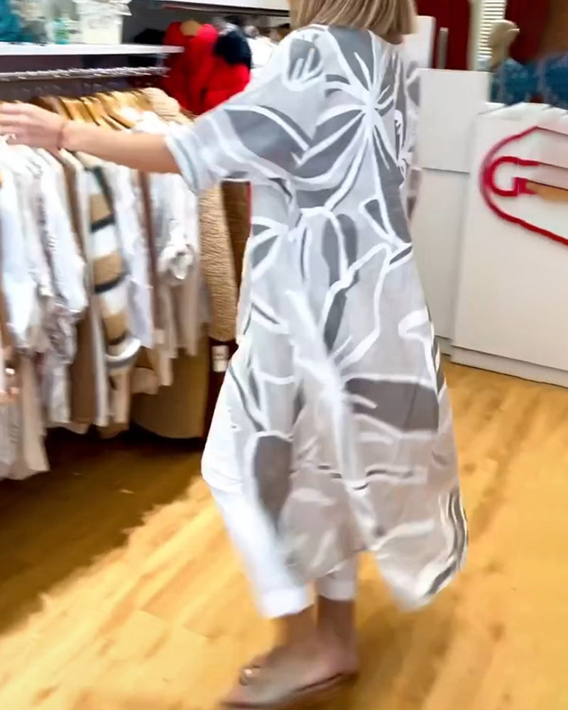 Top med løs, uregelmæssig pasform