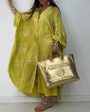 Langærmet oversized kjole med knapper og print