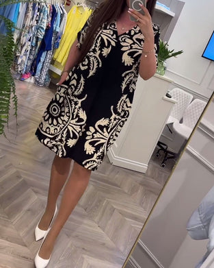 Knælang kjole med retro print