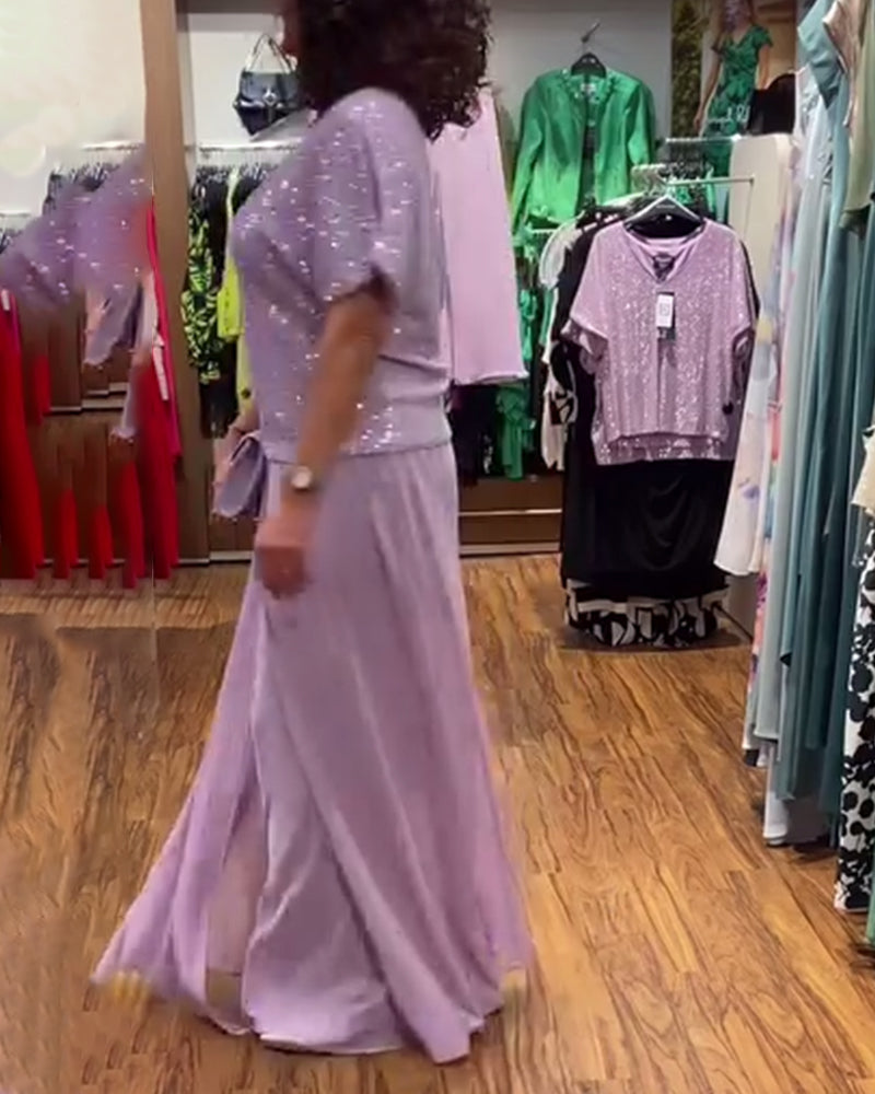 V-halset kortærmet bluse med pailletter